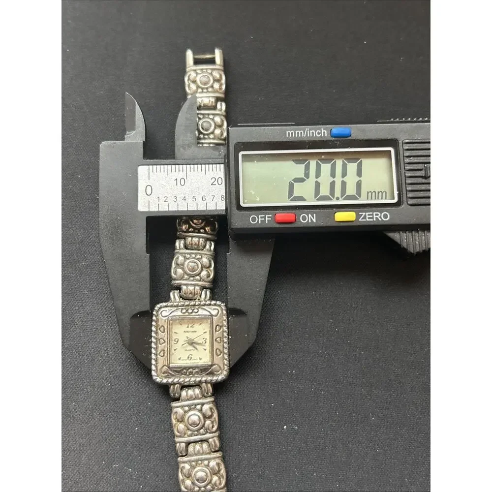 Attitude silver tone